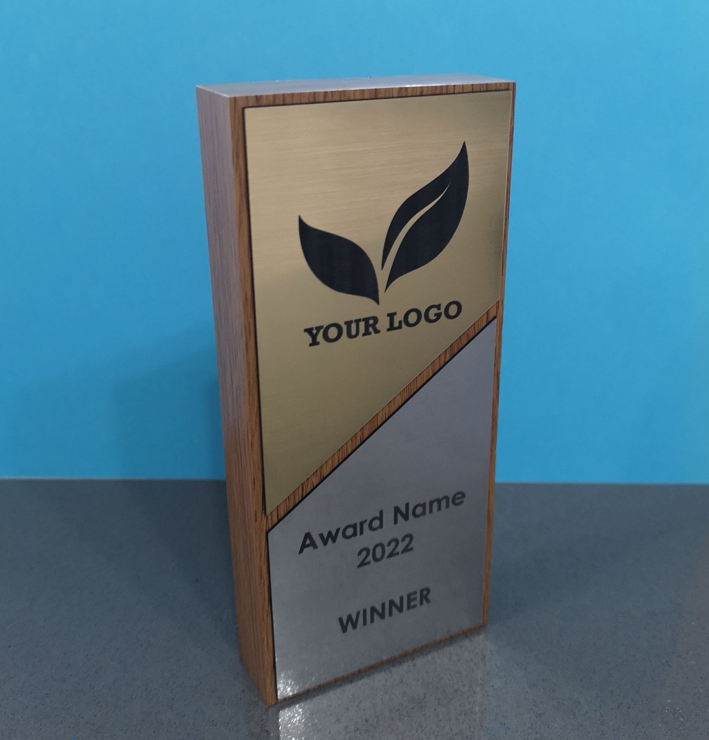 Light Oak Wooden Award with a Combination of Silver and Gold Engraving Area