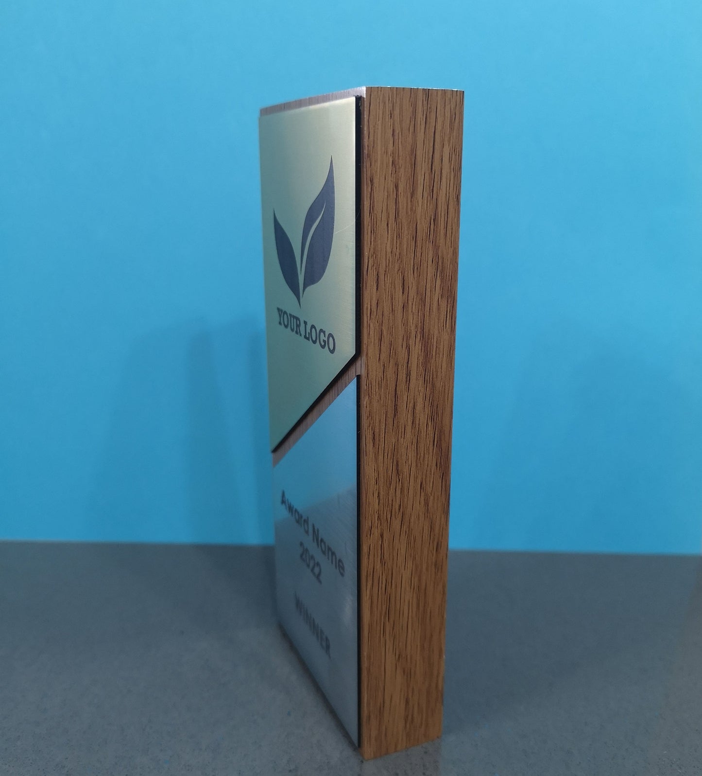 Light Oak Wooden Award with a Combination of Silver and Gold Engraving Area